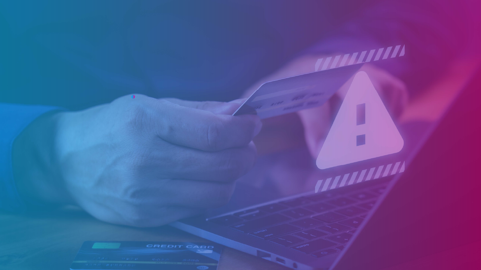 Person holding a credit card near a laptop with a warning icon overlay.