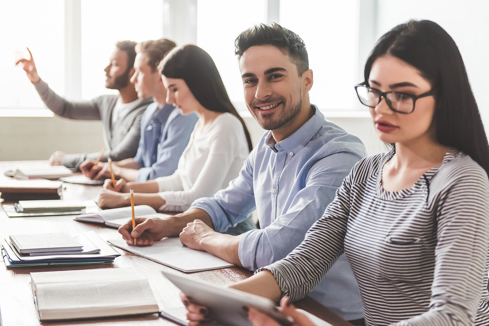 Photo of professionals sitting in a classroom setting